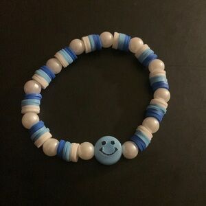 Blue smiley face bracelet